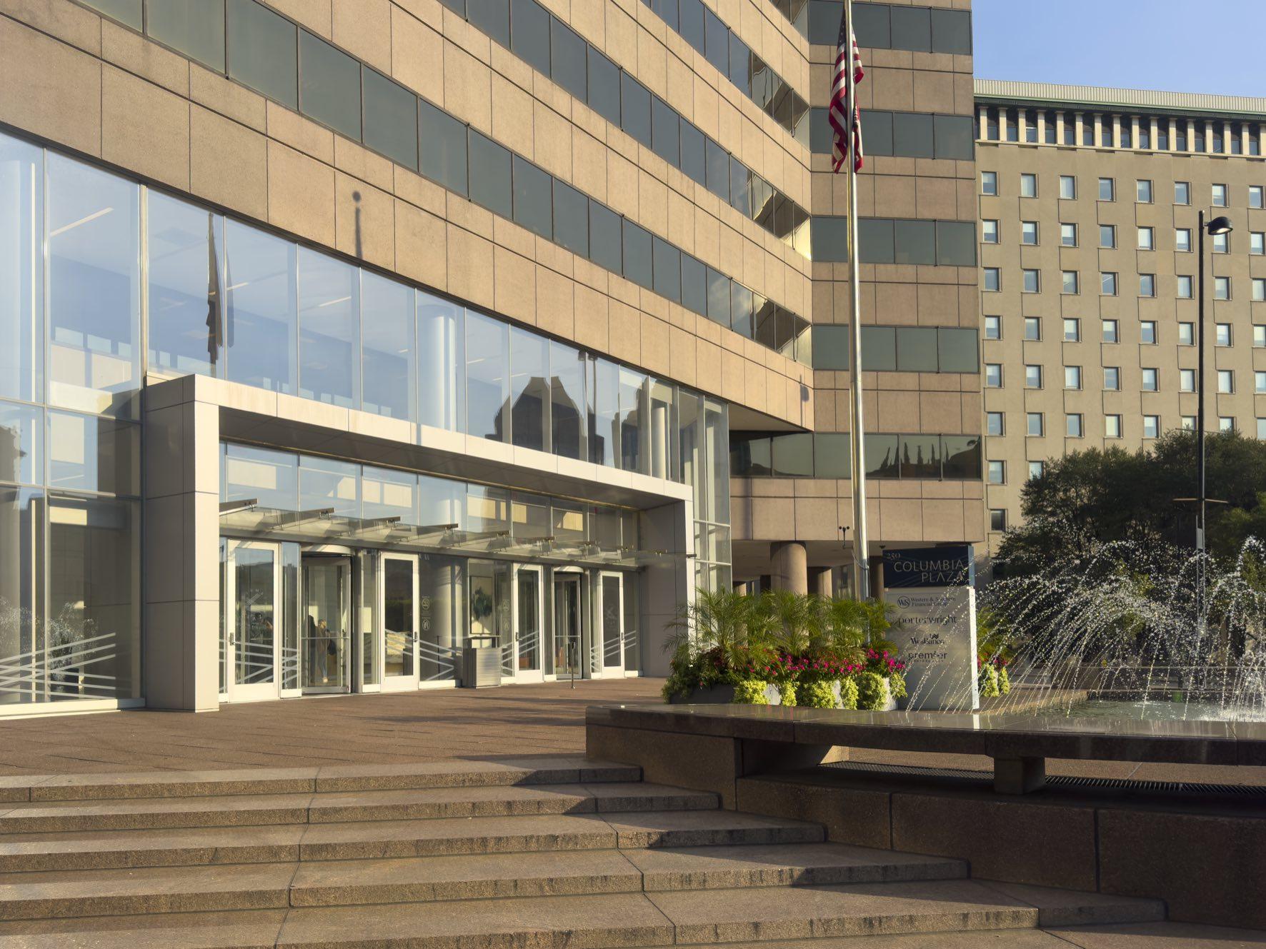 The Columbia Plaza entrance on 5th St, with the 250 Columbia Plaza sign and fountain, where Upforge's office is
