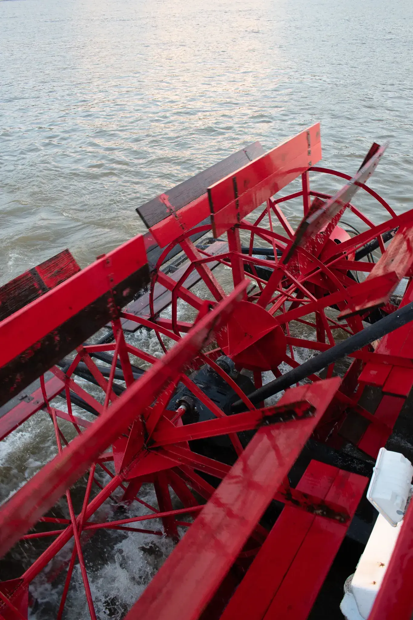 The Spirit's red paddlewheel churning the Ohio River