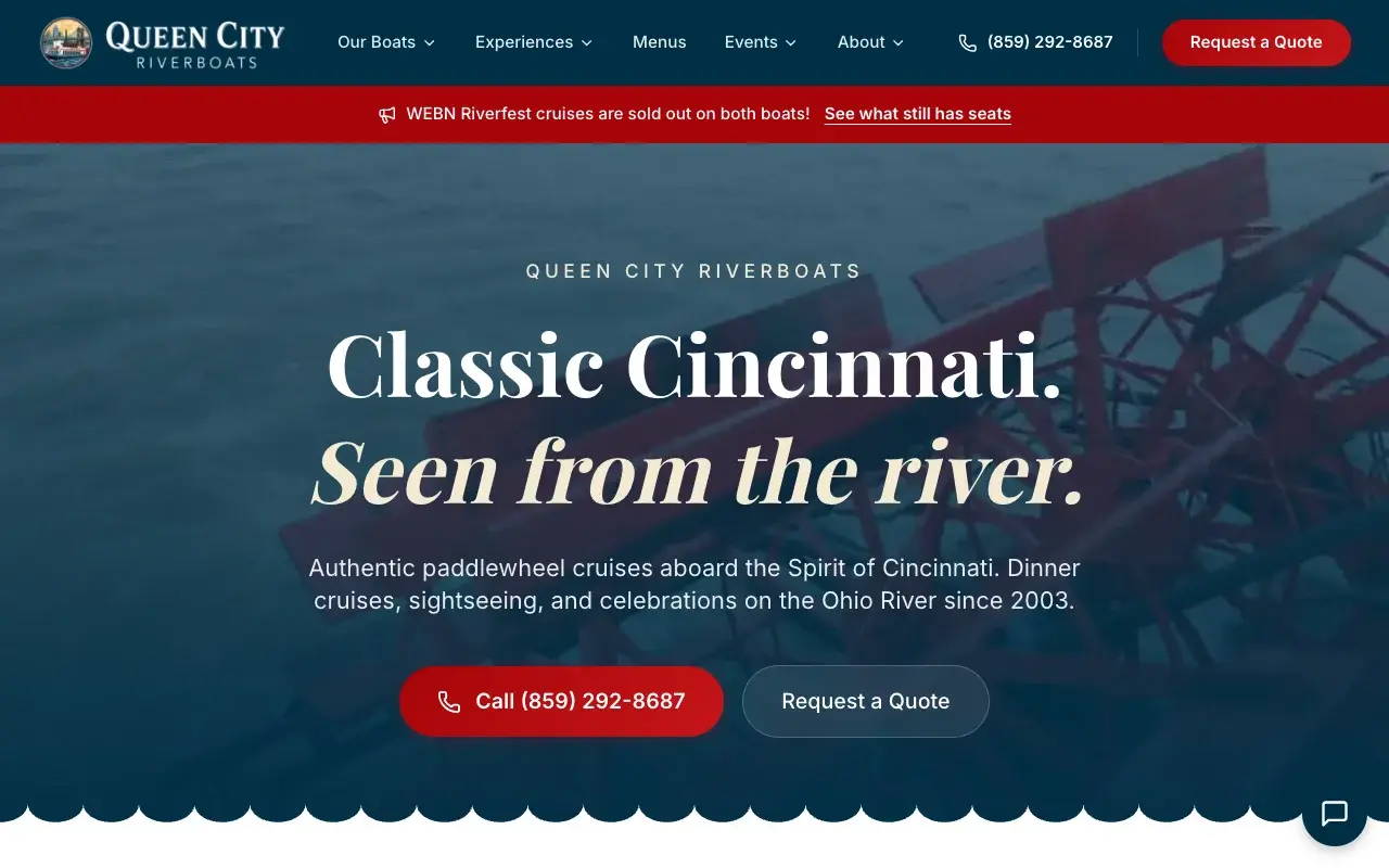 The new Queen City Riverboats homepage: the heritage badge, Classic Cincinnati. Seen from the river., and a red Call button