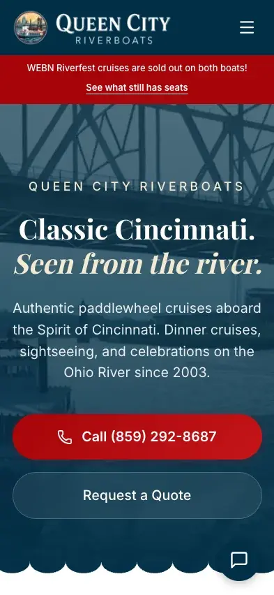 Queen City Riverboats homepage on a phone