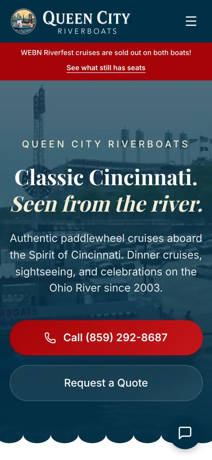 Queen City Riverboats homepage on a phone
