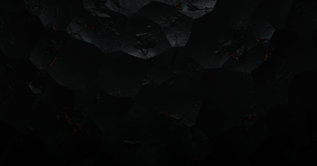 Jagged dark metal facets under cool light
