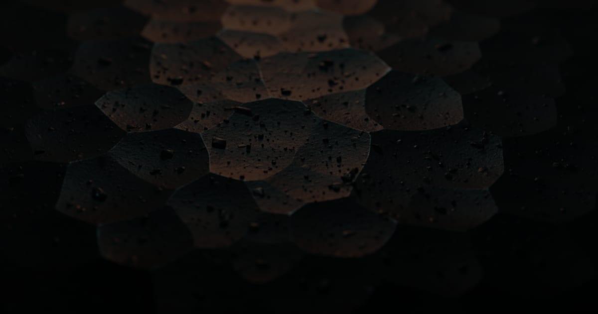 Layered facets of forged steel lit from above, illustrating how local SEO and web design work together for Cincinnati-region websites