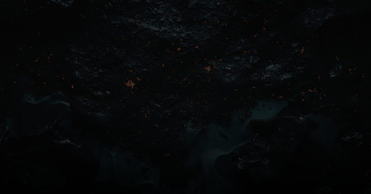 Scattered embers across dark forge coal under cool light, illustrating a website audit checklist to work through before a redesign